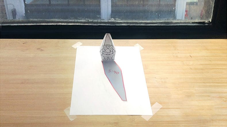 Gnome Statue at Window